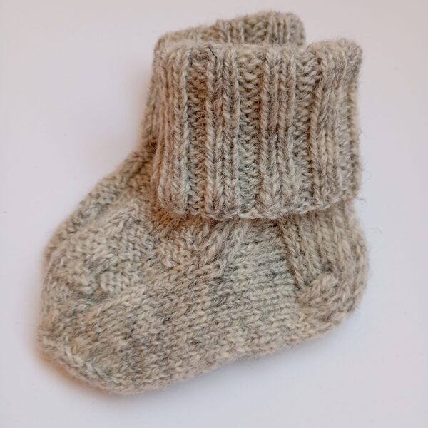 Knitting baby socks